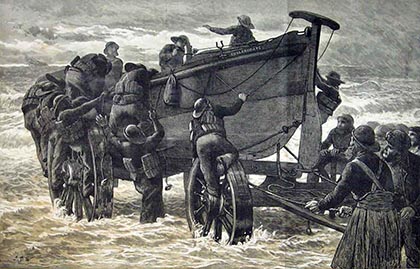The scene on the beach after the Mimi capsized dramatically with heavy loss of life as a result of an irresponsible and reckless salvage attempt. A wave breaks over the almost-submerged hull of the Mimi. Inside that hull are the bodies of drowned German sailors, trapped inside when the vessel capsized.
