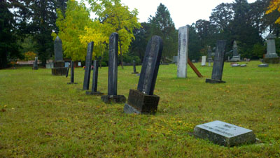 The John A. Porter family of grave markers, in the Odd Fellows Cemetery in Corvallis, Ore. From near to far, the markers are for Ame; the younger Mary Porter; the elder Mary Porter; Elsie Porter; and John Porter. The John A. Porter family of grave markers, in the Odd Fellows Cemetery in Corvallis, Ore. From near to far, the markers are for Ame; the younger Mary Porter; the elder Mary Porter; Elsie Porter; and John Porter.