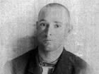 A prison mugshot of Ray Van Buren Jackson in 1896, a few years before he became a Silver Lake schoolteacher.